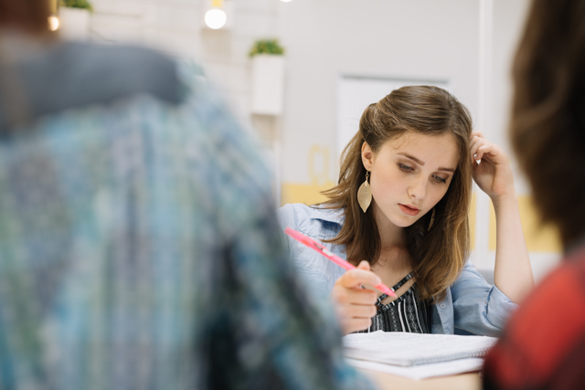 Pretty Student Studying Library