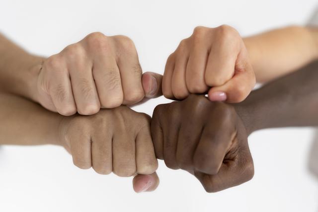 Close Up People Connecting Through Hands