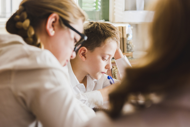 Classmates Doing Homework Together Image By Magnific