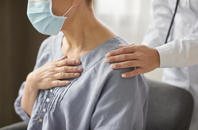 Side View Covid Recovery Center Female Doctor Checking Elder Patient